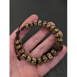 Naturbelassenes Vintage-Armband aus nepalesischem Yak-Knochen mit Rudraksha-Samen