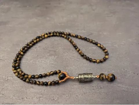 Tigerauge Mala Kette mit buddhistische Gebetsmühle Anhänger