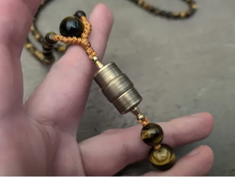 Tigerauge Mala Kette mit buddhistische Gebetsmühle Anhänger
