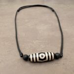 Dzi-Stein Halskette 3 Augen mit Vulkanit kaufen