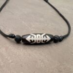 Dzi Stein Halskette „Glück“ kaufen – Tradition und Bedeutung