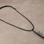 Echter dzi-stein 21-augen, Die Textur des Natursteins ist sichtbar Halsketten-Rezension